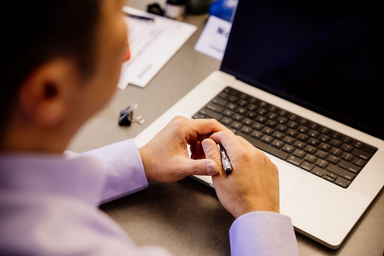 Working through a client problem at a laptop
